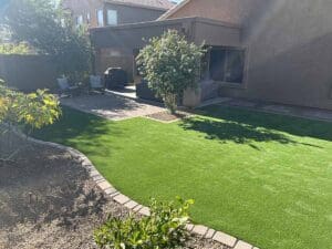 backyard install xeriscape with artificial turf
